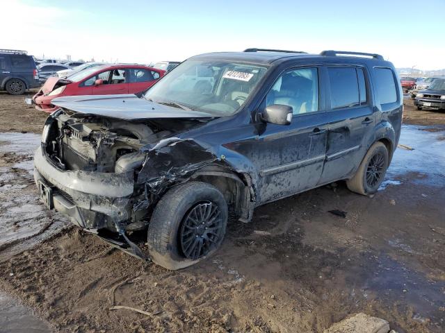Photo 1 from auction – 2014 HONDA PILOT TOUR with VIN 5FNYF4H99EB007856