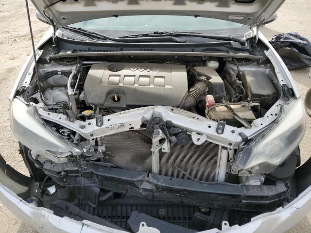 Photo 11 from auction – 2014 TOYOTA COROLLA L with VIN 5YFBURHE3EP083891
