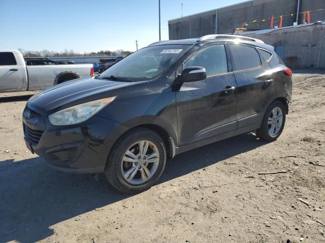 HYUNDAI TUCSON GLS 2012 with VIN KM8JUCAC8CU470577 - Photo from auction