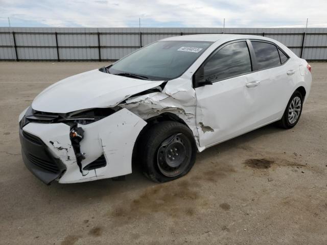TOYOTA COROLLA L 2018 with VIN 2T1BURHE9JC000815 - Photo from auction