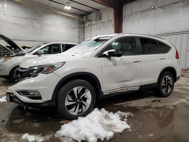 HONDA CR-V TOURI 2016 with VIN 5J6RM4H90GL004283 - Photo from auction