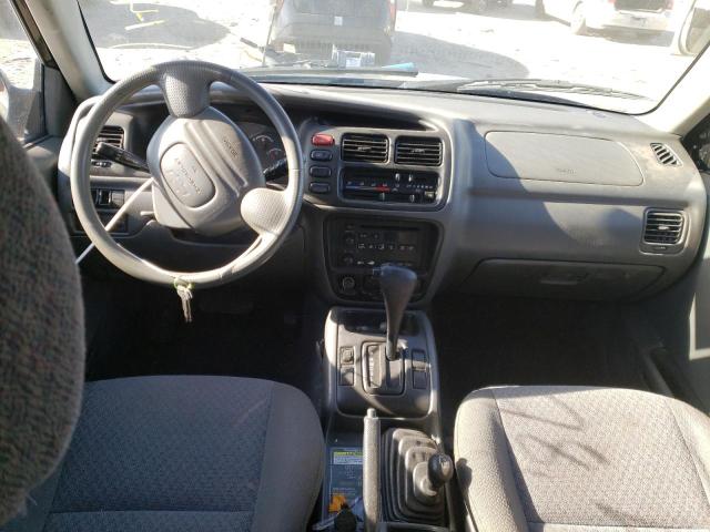 Photo 8 from auction – 2000 CHEVROLET TRACKER with VIN 2CNBJ13C3Y6935058