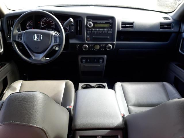Photo 8 from auction – 2014 HONDA RIDGELINE with VIN 5FPYK1F52EB006758