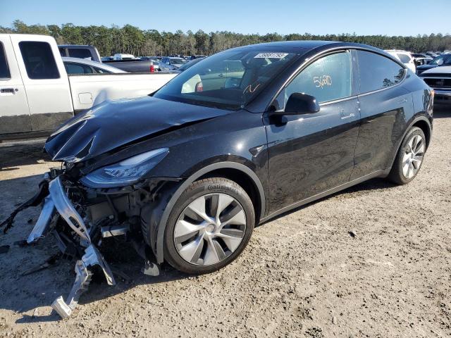 TESLA MODEL Y 2022 with VIN 7SAYGDEE6NA004833 - Photo from auction