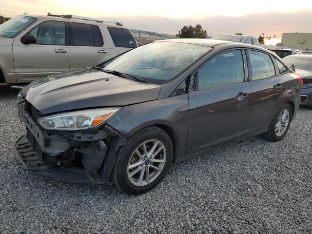 FORD FOCUS SE 2016 with VIN 1FADP3F27GL374496 - Photo from auction