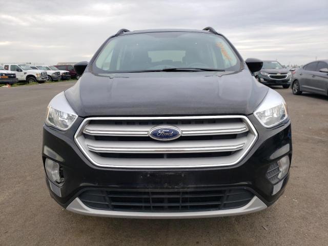 Photo 5 from auction – 2018 FORD ESCAPE SE with VIN 1FMCU0GD5JUC90137