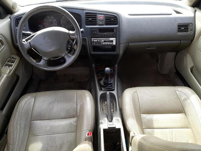 Photo 8 from auction – 2000 INFINITI G20 with VIN JNKCP11A2YT302419