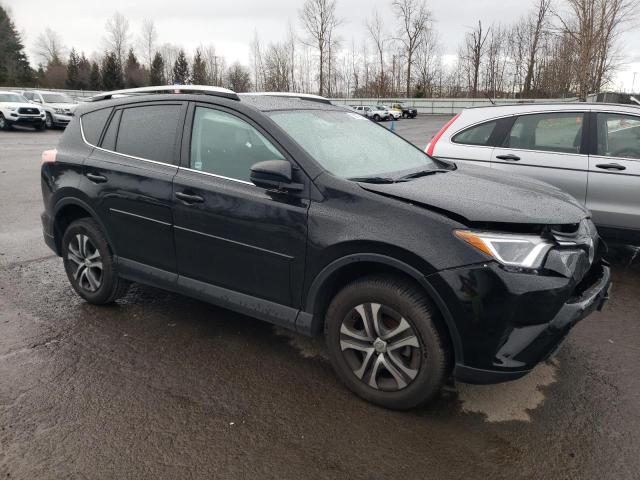 Photo 4 from auction – 2016 TOYOTA RAV4 LE with VIN 2T3BFREV5GW487122