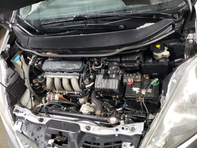 Photo 11 from auction – 2009 HONDA FIT with VIN JHMGE88209S007938