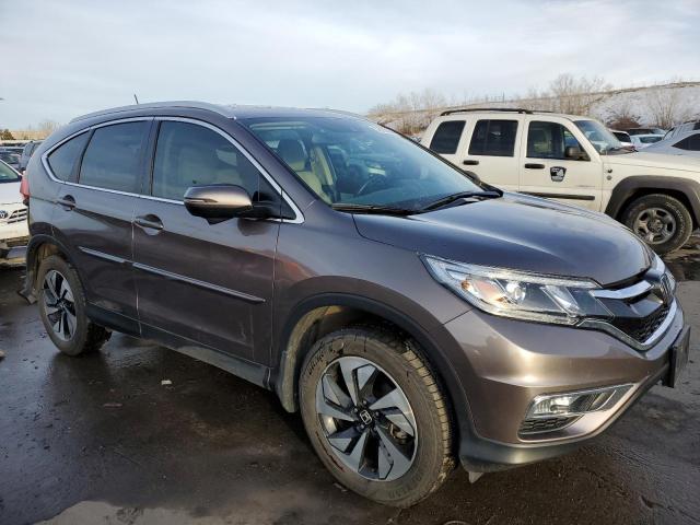 Photo 4 from auction – 2016 HONDA CR-V TOURI with VIN 5J6RM4H90GL131759