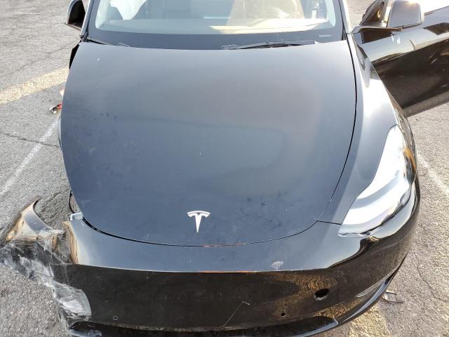Photo 12 from auction – 2022 TESLA MODEL Y with VIN 7SAYGDEE8NF441008