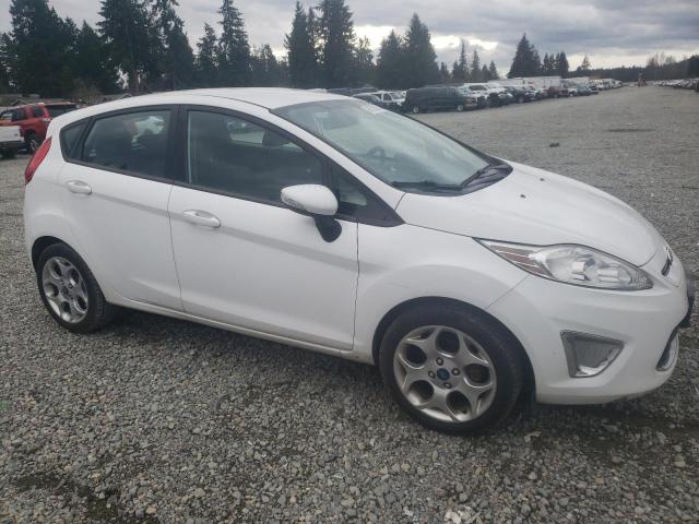 Photo 4 from auction – 2011 FORD FIESTA SES with VIN 3FADP4FJ2BM217060