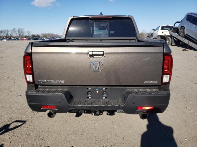 Photo 6 from auction – 2022 HONDA RIDGELINE with VIN 5FPYK3F79NB011680