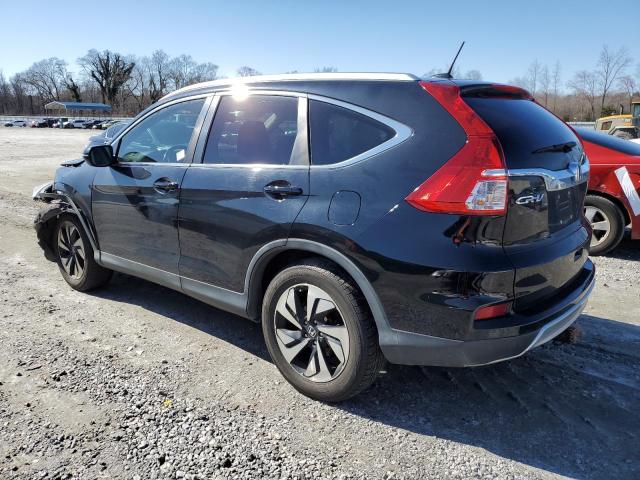 Photo 2 from auction – 2015 HONDA CR-V TOURI with VIN 5J6RM4H97FL028658