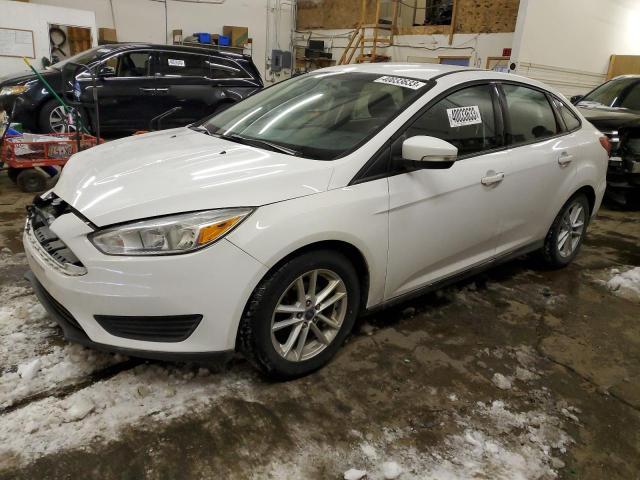FORD FOCUS SE 2017 with VIN 1FADP3F29HL299706 - Photo from auction