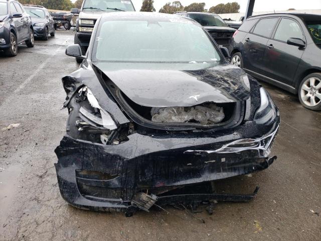 Photo 5 from auction – 2021 TESLA MODEL 3 with VIN 5YJ3E1EA6MF090333