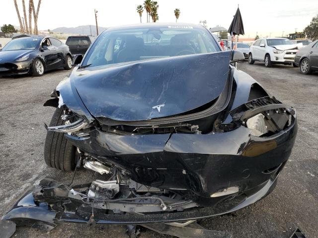 Photo 5 from auction – 2022 TESLA MODEL 3 with VIN 5YJ3E1EB0NF297391