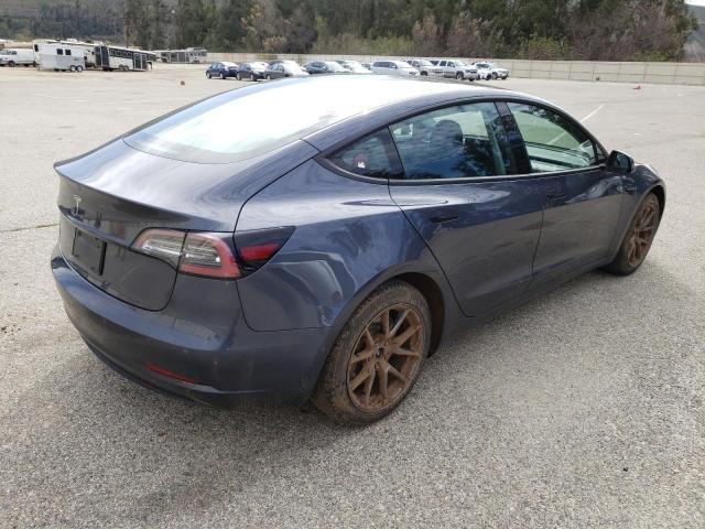 Photo 3 from auction – 2022 TESLA MODEL 3 with VIN 5YJ3E1EA6NF372800