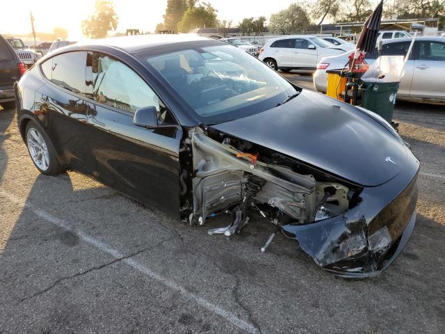 Photo 4 from auction – 2022 TESLA MODEL Y with VIN 7SAYGDEE8NF441008