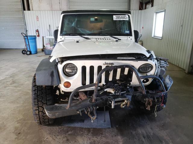 Photo 5 from auction – 2009 JEEP WRANGLER U with VIN 1J4GA39109L733096