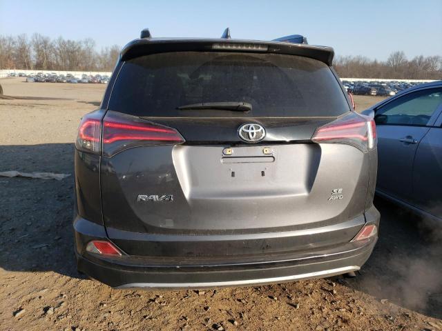 Photo 6 from auction – 2018 TOYOTA RAV4 SE with VIN JTMJFREV4JD239878