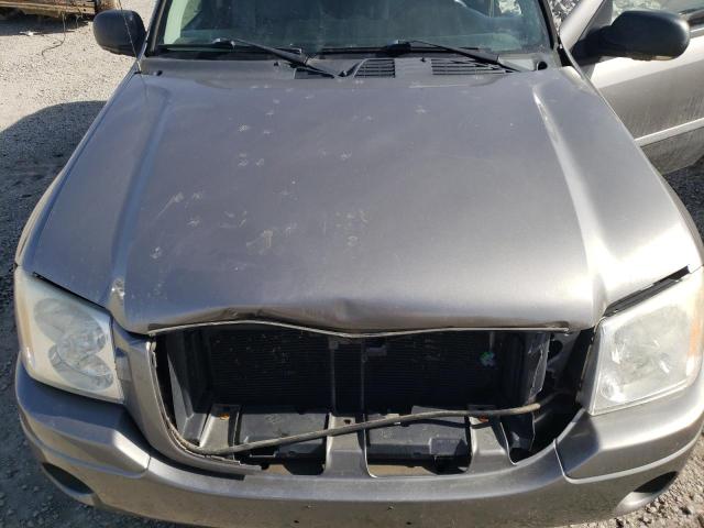 Photo 12 from auction – 2006 GMC ENVOY with VIN 1GKDT13SX62194243