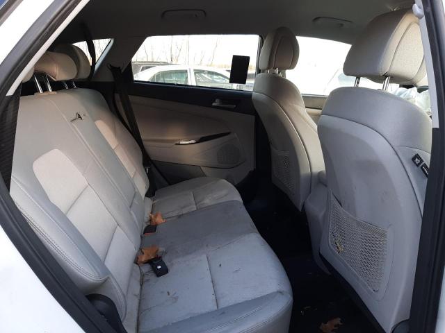Photo 11 from auction – 2018 HYUNDAI TUCSON SE with VIN KM8J2CA47JU791053
