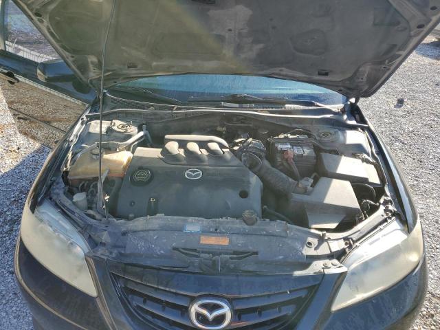 Photo 11 from auction – 2003 MAZDA 6 S with VIN 1YVFP80D335M51500