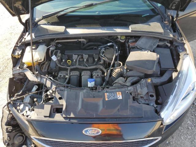 Photo 11 from auction – 2016 FORD FOCUS SE with VIN 1FADP3F29GL319841