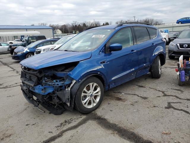 FORD ESCAPE SE 2018 with VIN 1FMCU9GD8JUB79067 - Photo from auction