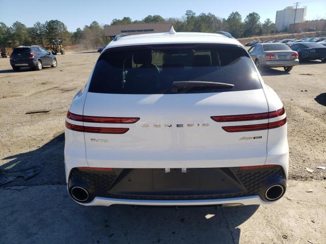 Photo 6 from auction – 2022 GENESIS GV70 BASE with VIN KMUMCDTC6NU031482
