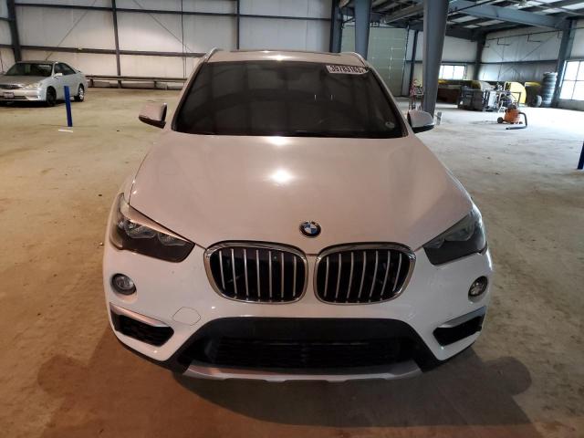 Photo 5 from auction – 2016 BMW X1 XDRIVE2 with VIN WBXHT3C39G5E54610