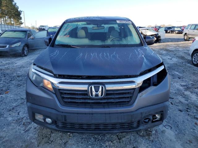 Photo 5 from auction – 2017 HONDA RIDGELINE with VIN 5FPYK2F40HB002161