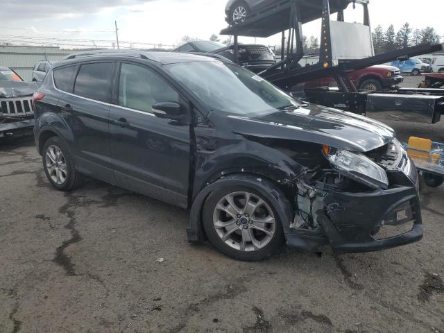 Photo 4 from auction – 2015 FORD ESCAPE TIT with VIN 1FMCU9J9XFUB45014
