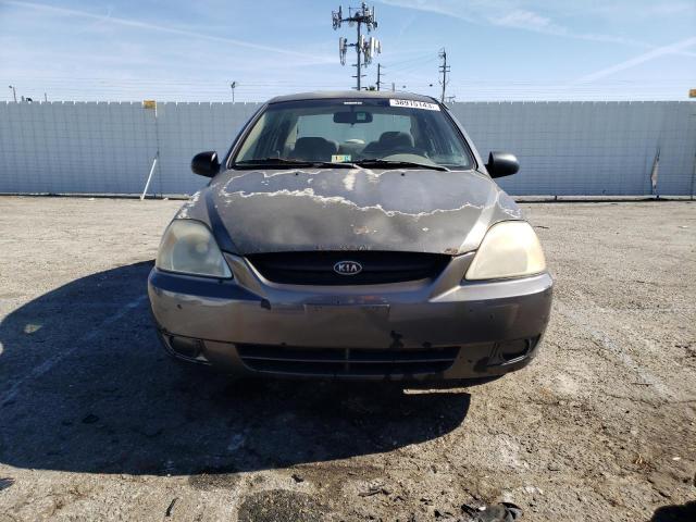 Photo 5 from auction – 2004 KIA RIO with VIN KNADC125046305702