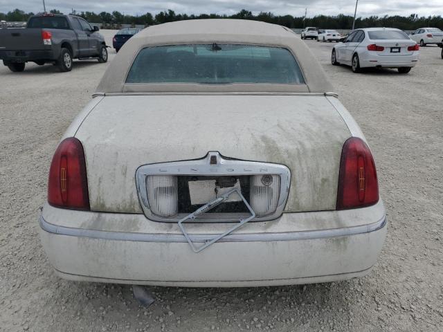 Photo 6 from auction – 2002 LINCOLN TOWN CAR C with VIN 1LNHM85W22Y623364