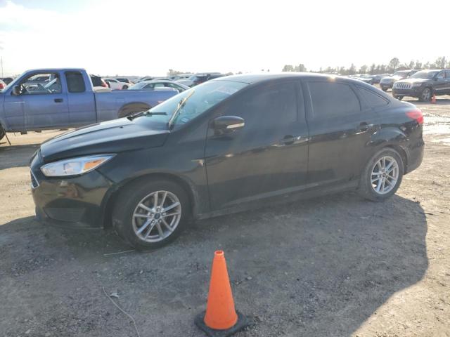 FORD FOCUS SE 2016 with VIN 1FADP3F29GL319841 - Photo from auction