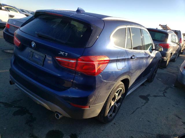 Photo 3 from auction – 2018 BMW X1 XDRIVE2 with VIN WBXHT3C35J5K29556