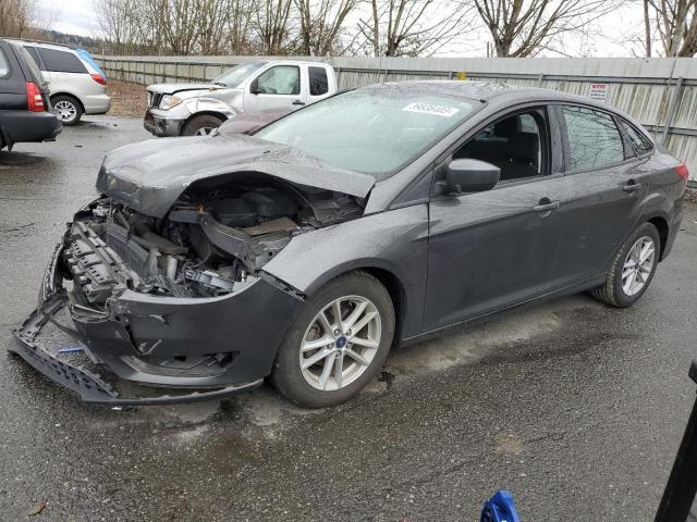 FORD FOCUS SE 2018 with VIN 1FADP3F23JL262236 - Photo from auction