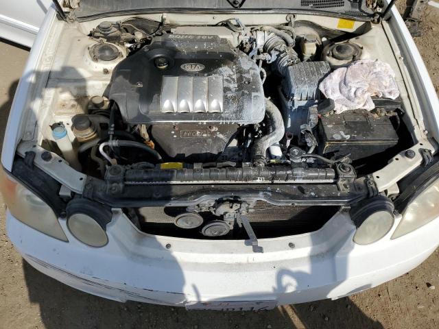 Photo 11 from auction – 2004 KIA OPTIMA LX with VIN KNAGD126645326451