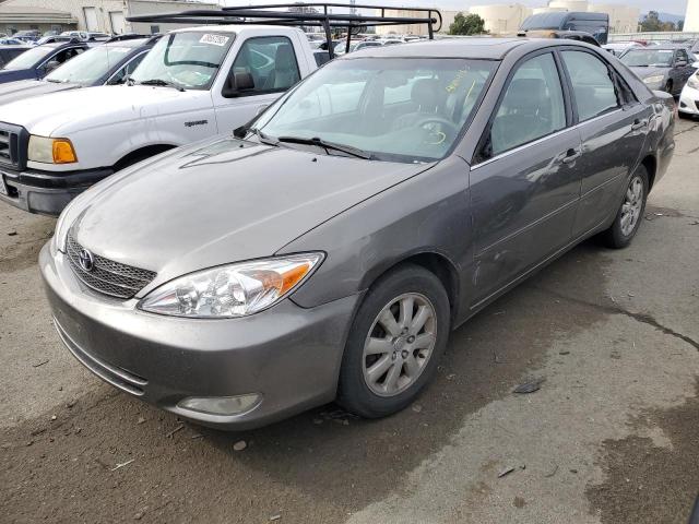 Photo 1 from auction – 2003 TOYOTA CAMRY LE with VIN 4T1BF30K83U561338