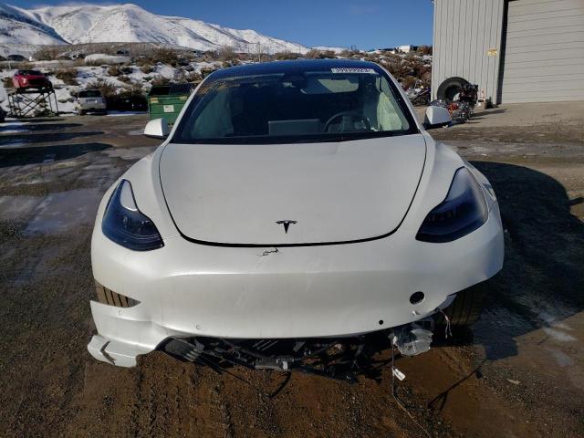 Photo 5 from auction – 2022 TESLA MODEL 3 with VIN 5YJ3E1EC2NF294467
