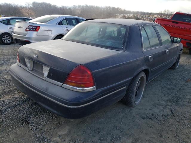 Photo 3 from auction – 2001 FORD CROWN VICT with VIN 2FAFP74W81X140304