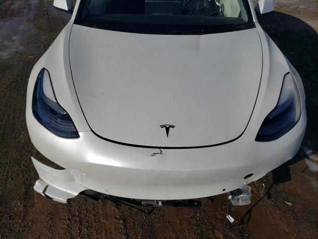 Photo 11 from auction – 2022 TESLA MODEL 3 with VIN 5YJ3E1EC2NF294467