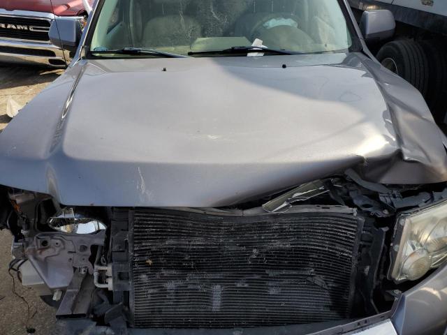 Photo 12 from auction – 2008 FORD ESCAPE LIM with VIN 1FMCU94158KE29025