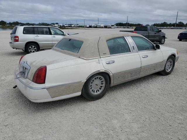 Photo 3 from auction – 2002 LINCOLN TOWN CAR C with VIN 1LNHM85W22Y623364