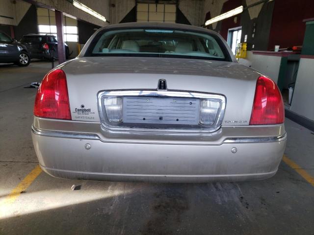 Photo 6 from auction – 2004 LINCOLN TOWN CAR E with VIN 1LNHM81W94Y639280