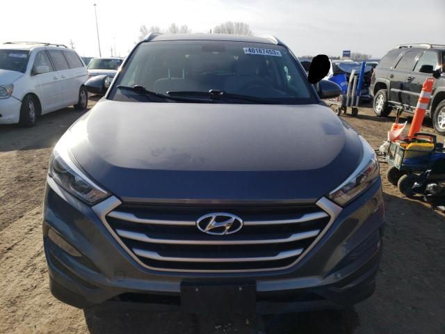 Photo 5 from auction – 2017 HYUNDAI TUCSON LIM with VIN KM8J3CA48HU418319