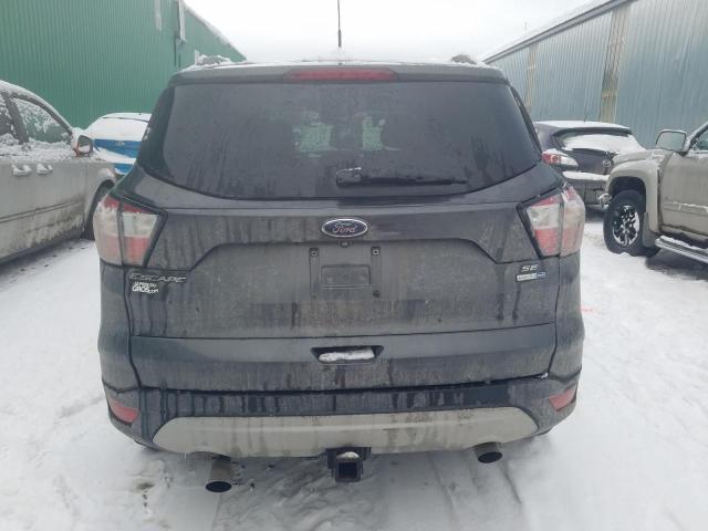 Photo 6 from auction – 2018 FORD ESCAPE SE with VIN 1FMCU9GD5JUC14941