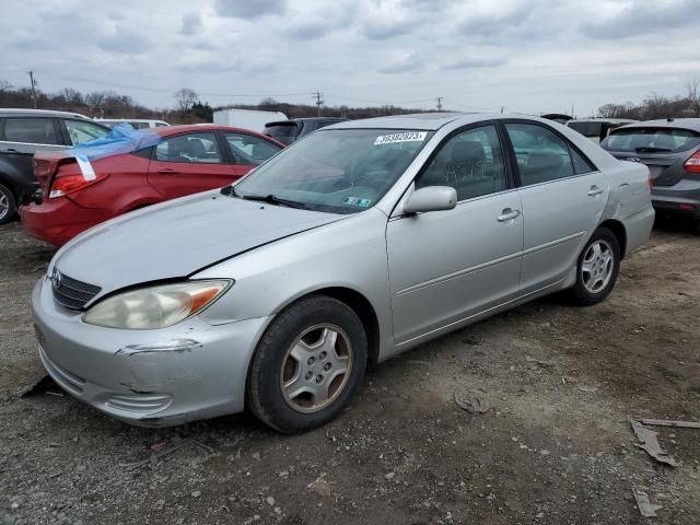 TOYOTA CAMRY LE 2003 with VIN 4T1BF32K53U560807 - Photo from auction